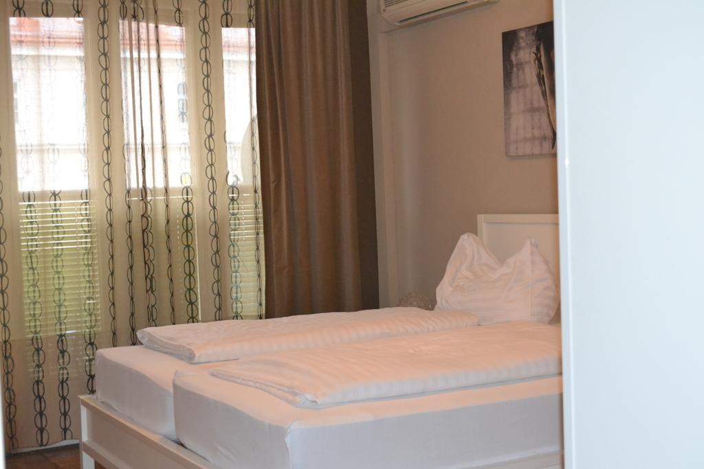 Goldfisch Apartment Hoher Markt Bécs Szoba fotó